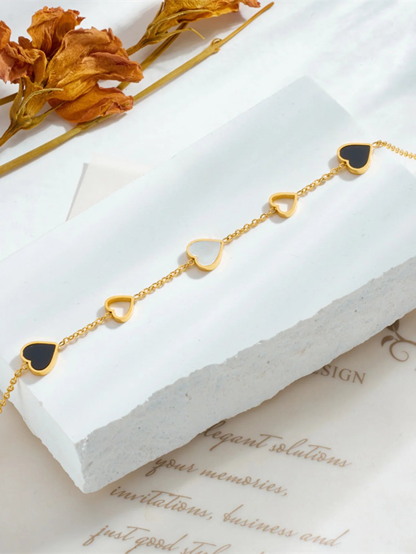 White, black and gray heart-shaped bracelet